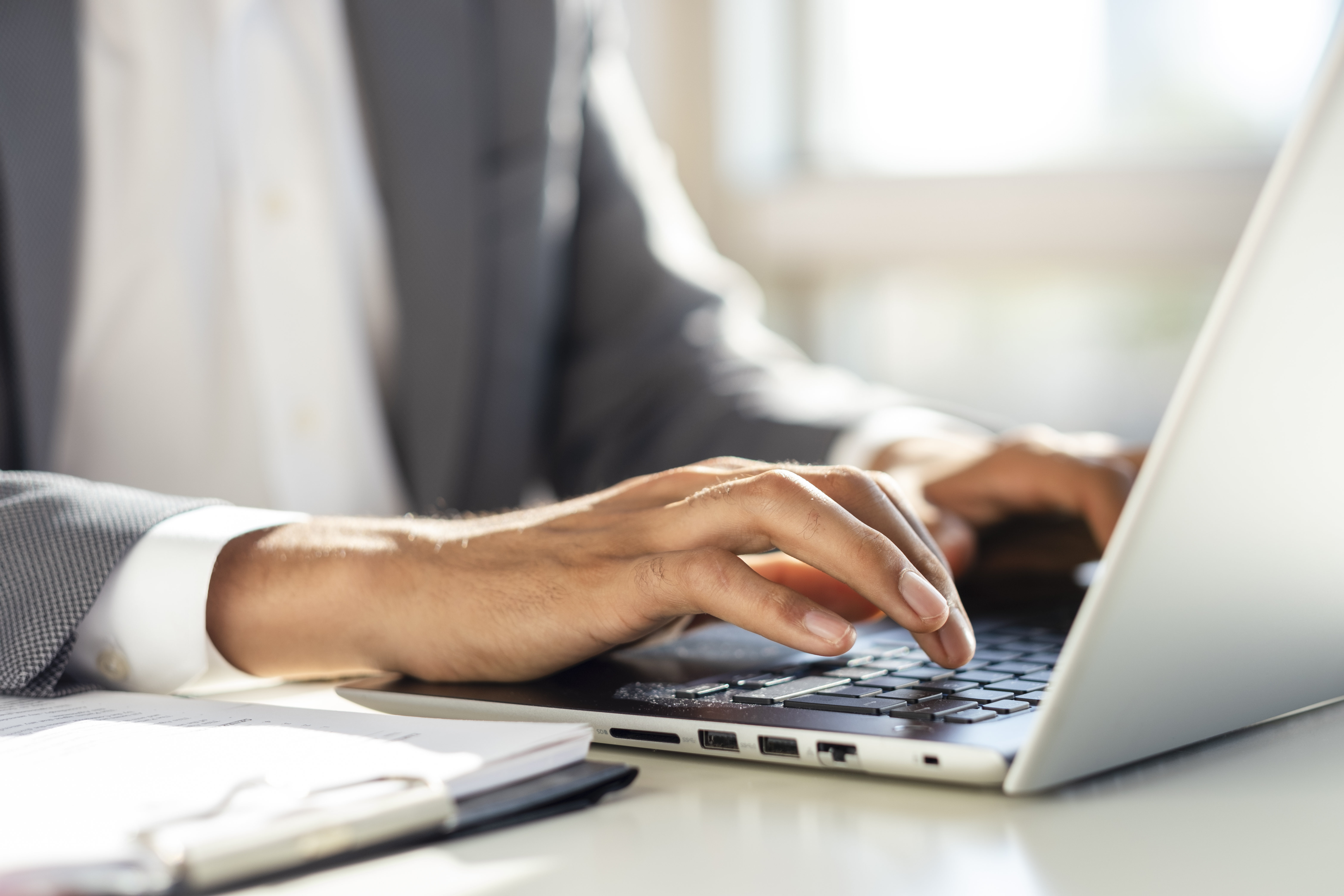 Typing on a computer - Member directory