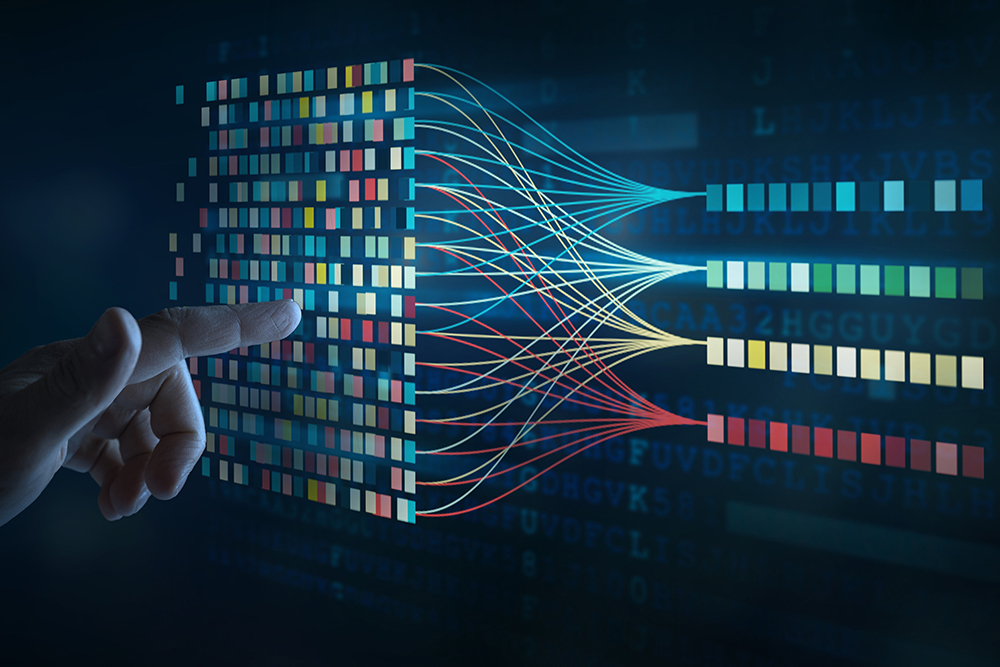 The image shows a hand pointing to a colorful grid of data blocks. From this grid, lines flow outward, sorting the colors into neat rows on the right. This represents how complicated data can be organized and transformed into something easier to understand, almost like making sense out of a puzzle. The background of letters and numbers highlights the idea of digital information and technology at work.