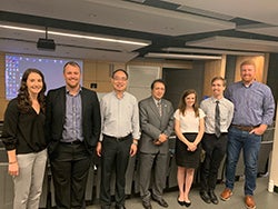 Middle Tennessee State University graduate students pictured alongside two faculty members after their internship presentation.